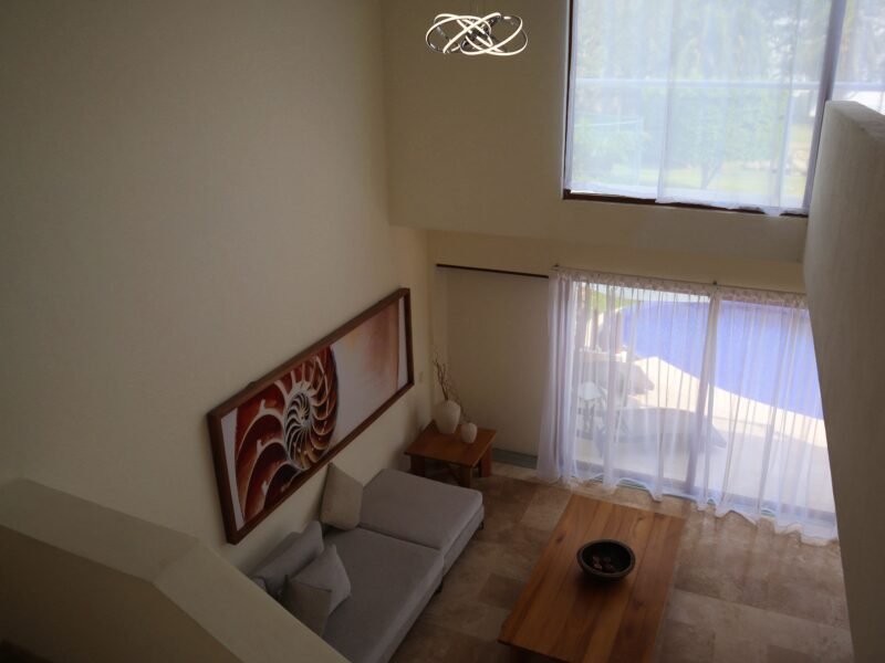 Casa frente de club de playa